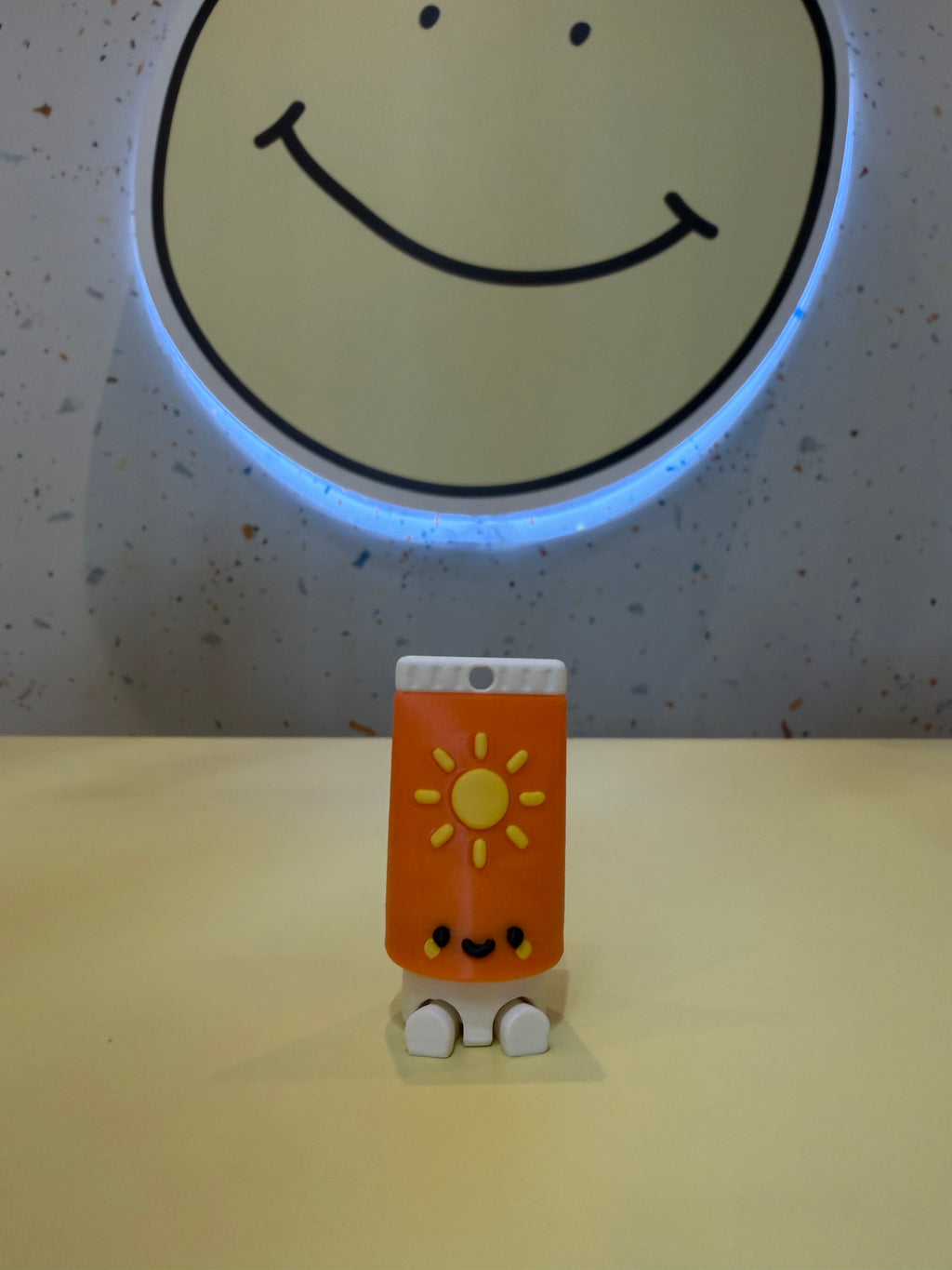 Sunblock Keychain Clicker